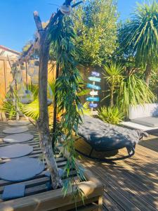 Sejours chez l'habitant Evasion Tropicale - Villa d'Artiste avec Jacuzzi Prive dans un jardin Exotique : photos des chambres