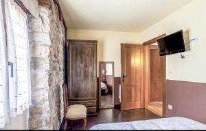 La Tienda de Abajo - Apartamentos acogedores con calefacción, parking y vistas al Valle de Soba