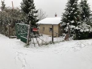 Házikó a Domboldalon