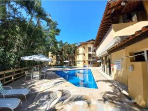 Riviera de São Lourenço Apto Completo com Churrasqueira Serviço de Praia Piscina aquecida Sauna salão de jogos e quadra