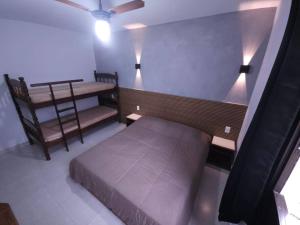 Riviera de São Lourenço Apto Completo com Churrasqueira Serviço de Praia Piscina aquecida Sauna salão de jogos e quadra