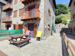 Apartamento con terraza y vistas panorámicas en Taüll con plaza de parking