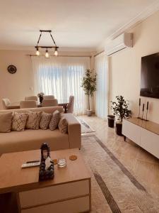 Bright & Spacious 3-Bedroom Apartment with Garden Views