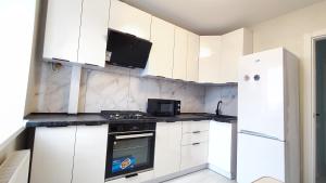 Партизанська 23 CityRooms