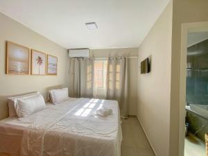 AP01 de 2 suítes para até 8 pessoas em condomínio a 3 minutos a pé da praia de Taperapuan