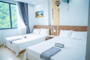Phòng 2 Giường Đơn Nhìn Ra Hồ. (Twin Room with Lake View)