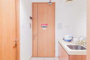 Best Deal and Homey Studio Apartment Tree Park City Cikokol By Travelio