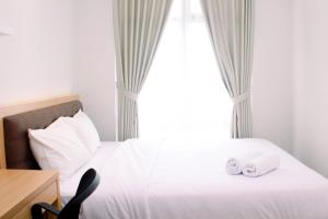 Comfort 1BR at Vasanta Innopark Apartment By Travelio