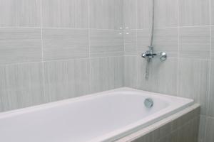 Comfort 1BR at Vasanta Innopark Apartment By Travelio