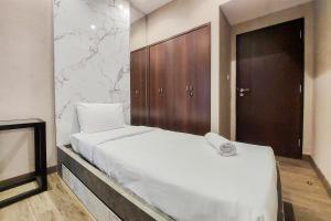 Cozy Stay 2BR Branz BSD City Apartment near AEON Mall By Travelio