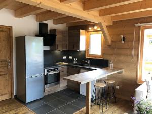 Appartements L-Arpa - Duplex dans Chalet Neuf - Vue MontBlanc : photos des chambres