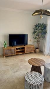 Logement vue mer, golf et jardin