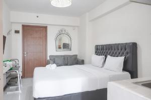 Warm and Tidy Studio at Cinere Resort Apartment By Travelio