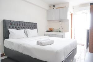 Warm and Tidy Studio at Cinere Resort Apartment By Travelio