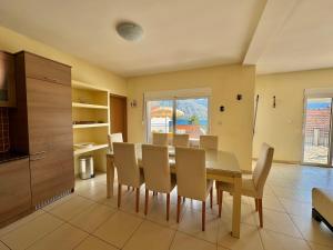 Prcanj sunny port apartments with shared pool