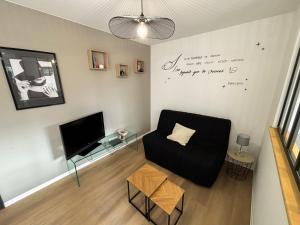 Appartements Les Reflets du Chateau - Parking Gratuit - Cosy & Moderne - Route des vins : photos des chambres