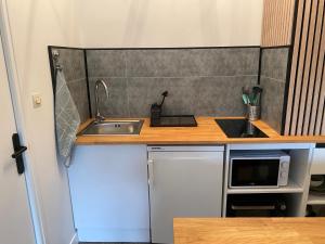 Appartements Appartement moderne proche commerces : photos des chambres