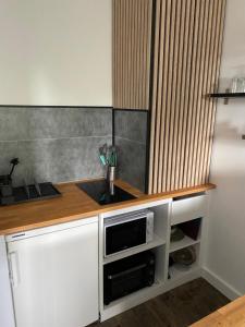 Appartements Appartement moderne proche commerces : photos des chambres