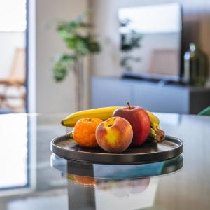 Sunlit Serenity Modern Apartment with City Views