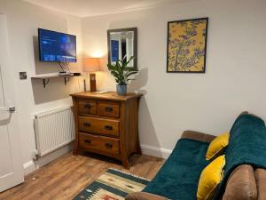 Self contained two room studio apartment, own entrance, private parking