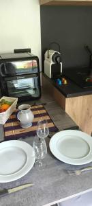 Maisons de vacances Au fond du jardin : photos des chambres