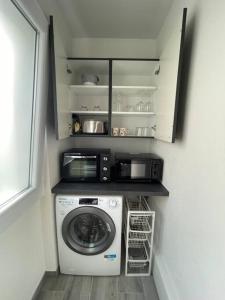 Appartements T2 Elio - proche gare et aeroport, parking prive : photos des chambres