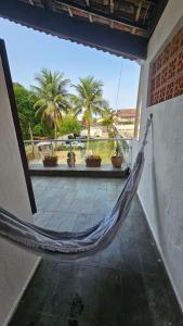 Pousada I House Beach Brasil - com piscina, garagem GRATUITA, Wi Fi, Espaço família para churrasco, Suites com varanda e frigobar, Suites com banheiro e Quartos Standart com banheiro externo, 300m da praia da Tupi, restaurantes e padarias na esquin