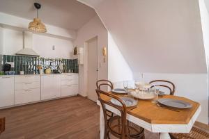 Appartements Balthazar Fauvette, bel appart hyper centre Epernay : photos des chambres