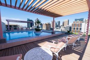 The Rose 502 - City Centre Aprt with Rooftop Pool - FREE Daily Housekeeping