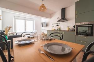 Appartements Jeroboam Fauvette, bel appartement hyper centre Epernay : photos des chambres