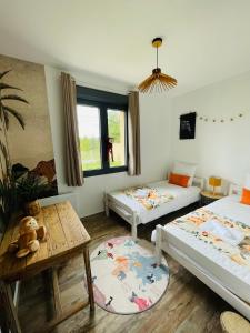 Maisons de vacances Maison plain-pied : photos des chambres