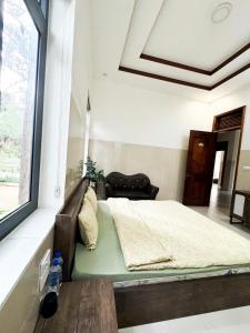 Phòng Có Giường Cỡ Queen Nhìn Ra Vườn (Queen Room with Garden View)