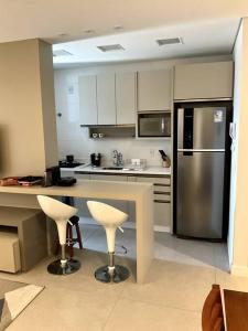 Apto Elegante com Localização Privilegiada e Rooftop incrível