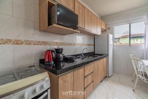 Apto 2Q a 260m da praia do Canto - Itapema RTL0302