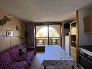 Appartements Residence Soleil - Appartement T2 skis aux pieds avec vue sur les montagnes et place de parking privee couverte MAE-5401 : photos des chambres