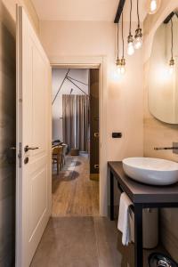 Eco Chic room with sofa bed and kitchen by Design Club Collection