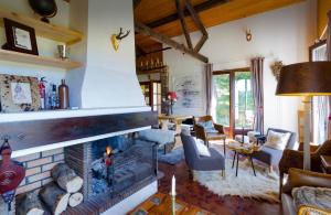 Grand chalet de charme cosy, sauna & vue de rêve