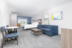 Queen Suite with Two Queen Beds and Sofa Bed room in Holiday Inn Express Hotel and Suites Valparaiso an IHG Hotel
