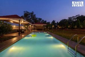 Casa Enchante by StayVista - Pool, views, ping pong, and a lush lawn for a perfect retreat
