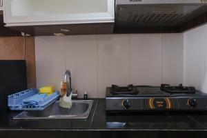 Homey Studio Apartment at Gateway Pasteur By Travelio