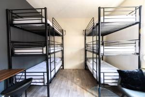 Sejours chez l'habitant Chambre avec 6 lits chez l-hote : photos des chambres