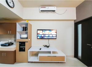 Comfortable and Homey 1BR at Uttara The Icon Apartment By Travelio