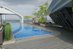 Comfortable and Homey 1BR at Uttara The Icon Apartment By Travelio