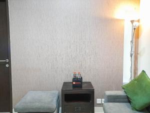 Comfortable and Homey 1BR at Uttara The Icon Apartment By Travelio