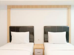 Cozy Studio Room at De Prima Apartment By Travelio