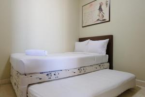 Spacious and Modern 2BR at Apartment Dago Butik By Travelio