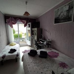 Maisons de vacances Maison entiere 5 chambres a 10mn a pied de l-entree principale du Circuit 24h Du Mans : photos des chambres