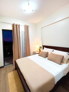 Comfortable 2 Bedroom Condo near tourist spots with free parking