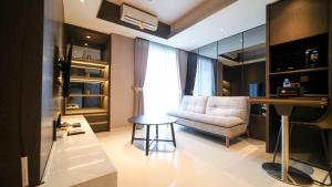 Modern and Cozy 2BR at Grand Sungkono Lagoon Apartment By Travelio