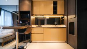 Modern and Cozy 2BR at Grand Sungkono Lagoon Apartment By Travelio